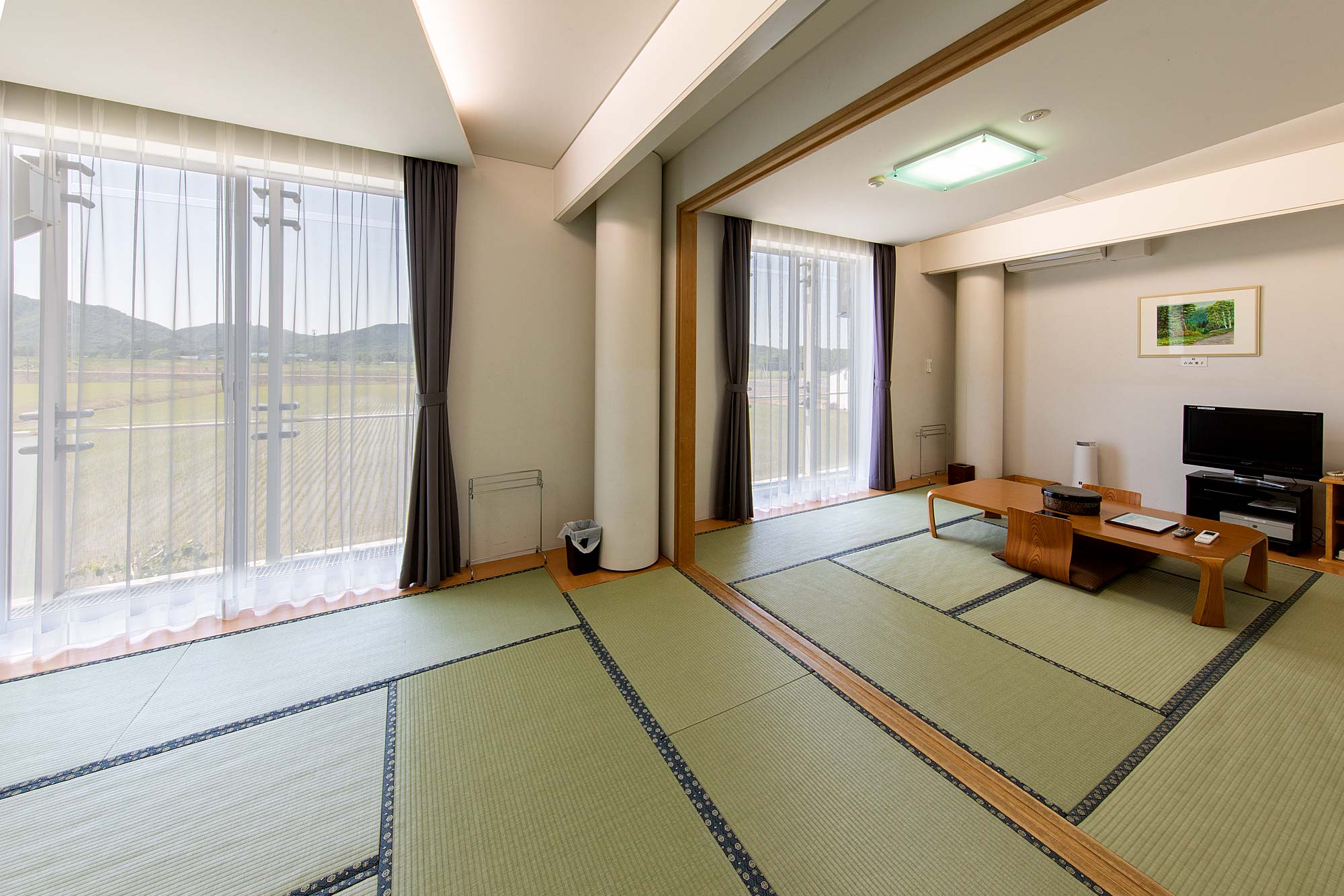 海道新十津川町サンヒルズサライ　客室　和室2つ分の広さの大部屋の写真1