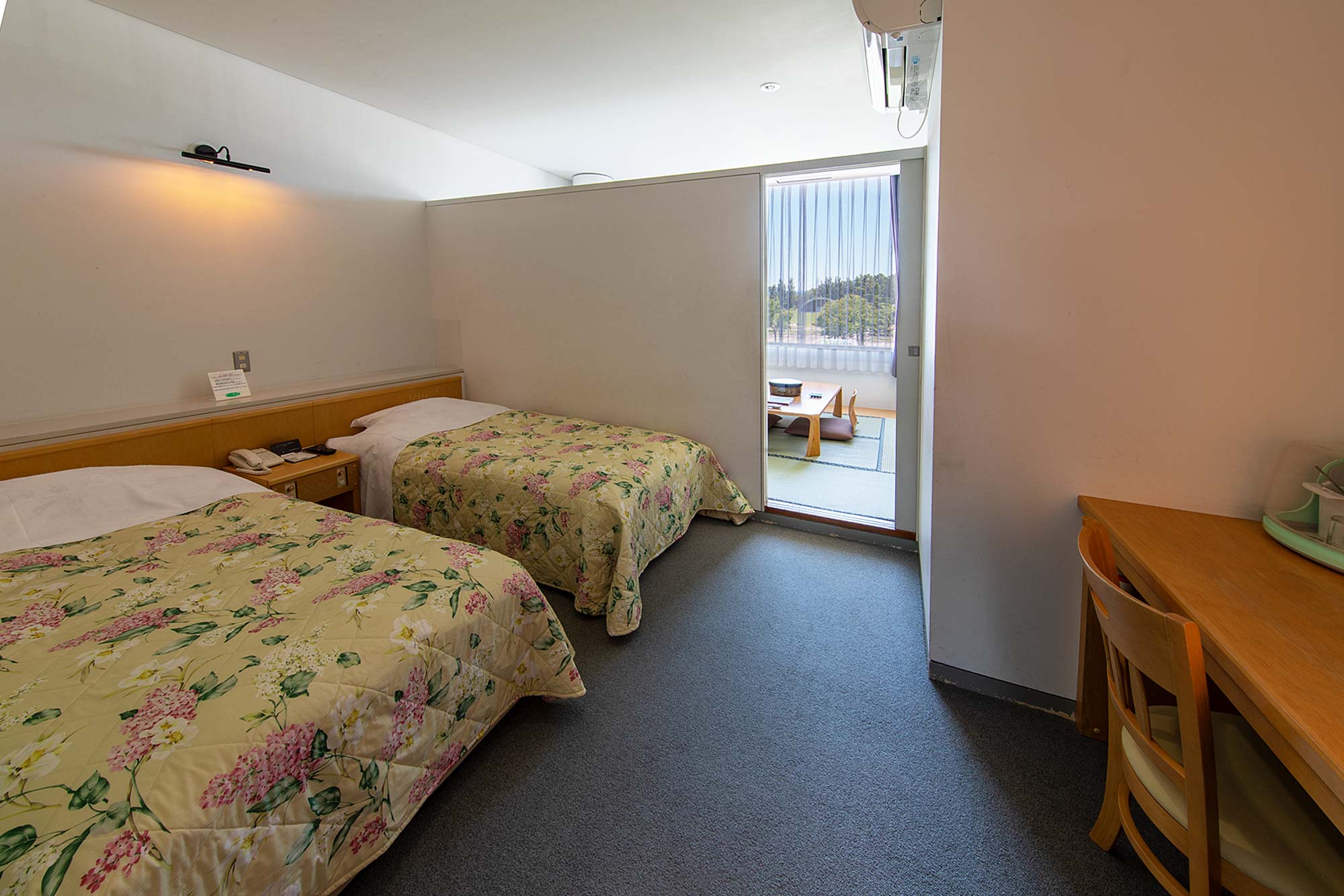 海道新十津川町サンヒルズサライ　客室　ベッドルーム併設の和洋室の写真2